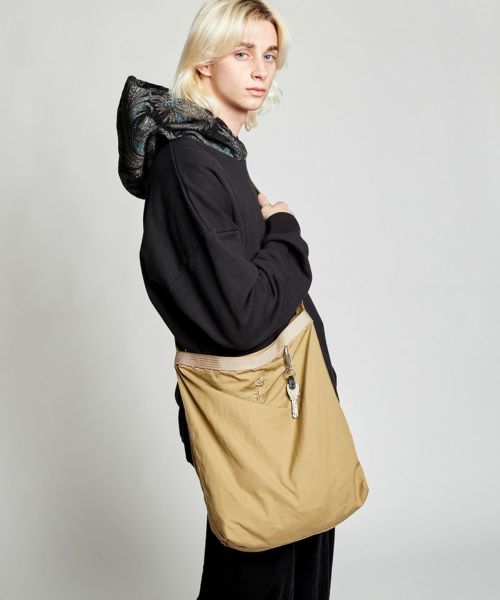 ADAM PATEK(アダムパテック)】shrink leather drawstring mini bag