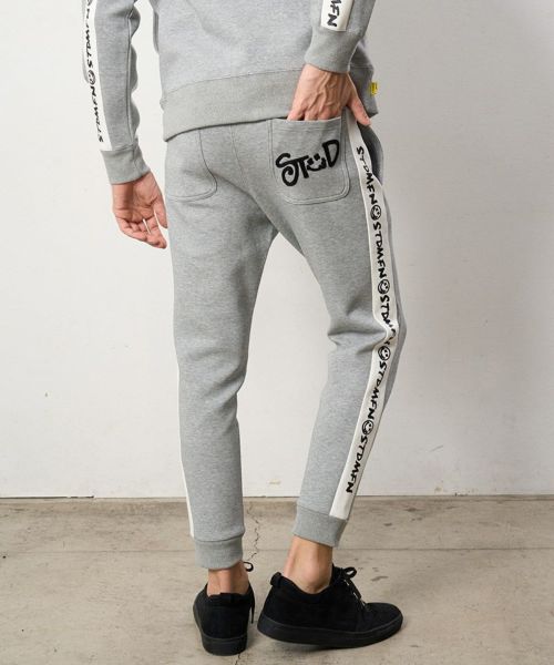 20%OFF【STUD MUFFIN(スタッドマフィン)】T-Rストレッチポンチ ライングラフィティプリントリブパンツ(514-06272)