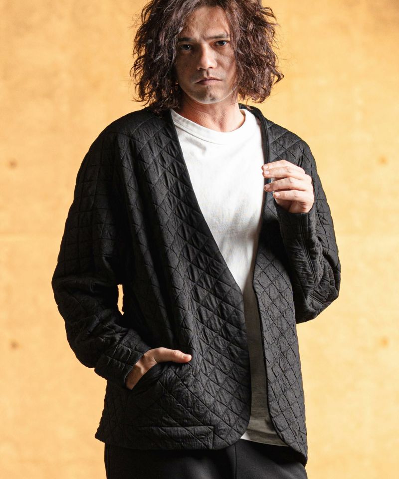 GLIMCLAP(グリムクラップ)】 Quilted fabric collarless jacket
