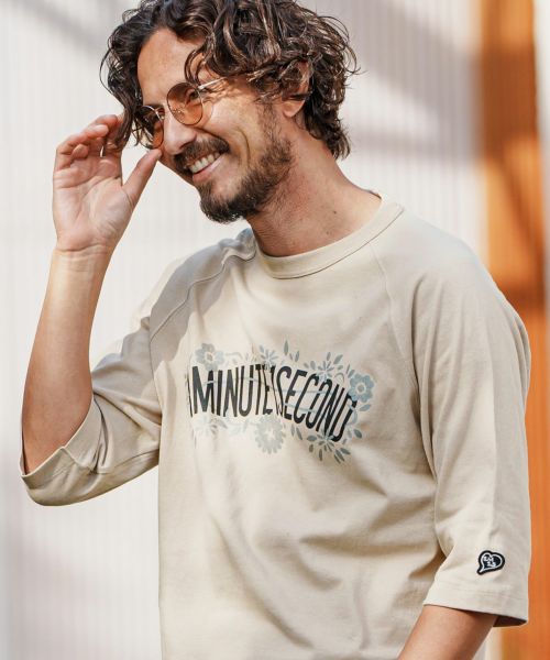 【1minute 1second(ワンミニットワンセカンド)】 monochrome flower logo print dry cotton cut&sew ラグランカットソー(1M25H230)
