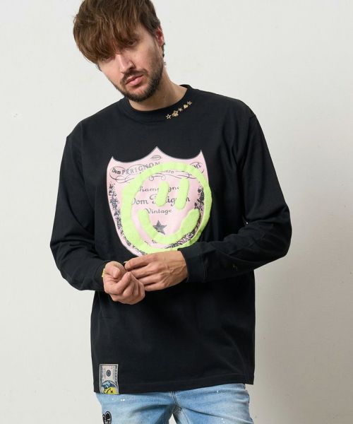 【STUD MUFFIN(スタッドマフィン)】【予約販売8月中旬～下旬入荷】 5.6ozコットン天竺 ラベルスマイル発泡プリントLS Tシャツ(524-02819)